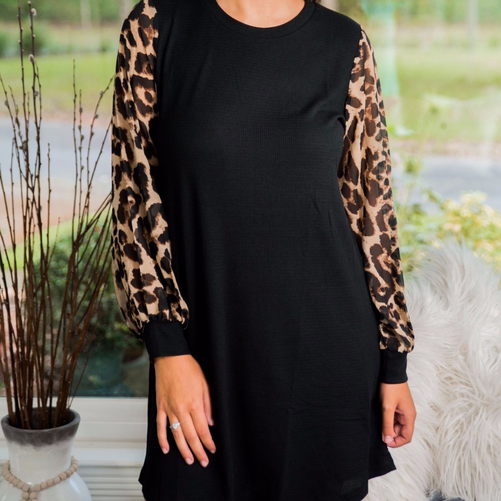 Black dress with leopard sleeves